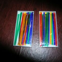 Two Boxes of Swizzle Sticks ( 16 each box) $4