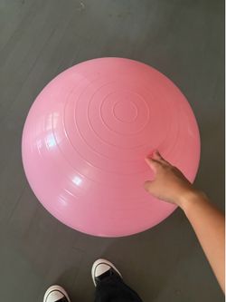 Pink exercise/ yoga stability ball and pump
