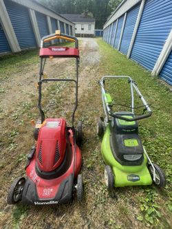 2 Battery Powered Lawn Mowers