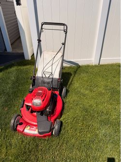 Self propelled lawn mower