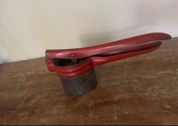 Antique potato press