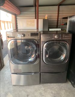 LG Washer And Electric Dryer With Pedestals