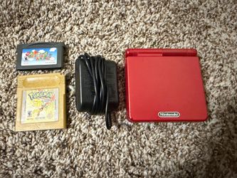 Gameboy Advance with Pokémon Gold and Mario