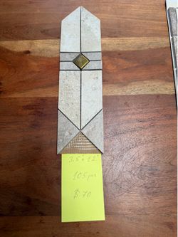 Assorted decorative, ceramic and stone tiles.