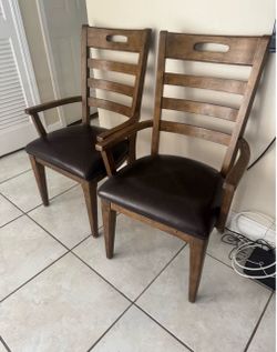 Pair Of Solid Wood Arm Chairs