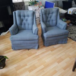 Pair of Swivel Rocking Chairs
