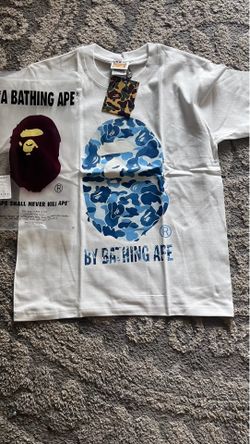 small white and blue bape shirt