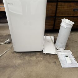  Toshiba - 6,000 (DOE) BTU Portable Air Conditioner Cools 250 Sq. Ft. with Dehumidifier and Remote Control in White Toshiba - 6,000 (DOE) BTU Portable