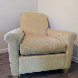 Cozy Upholstered Armchair with Matching Footrest