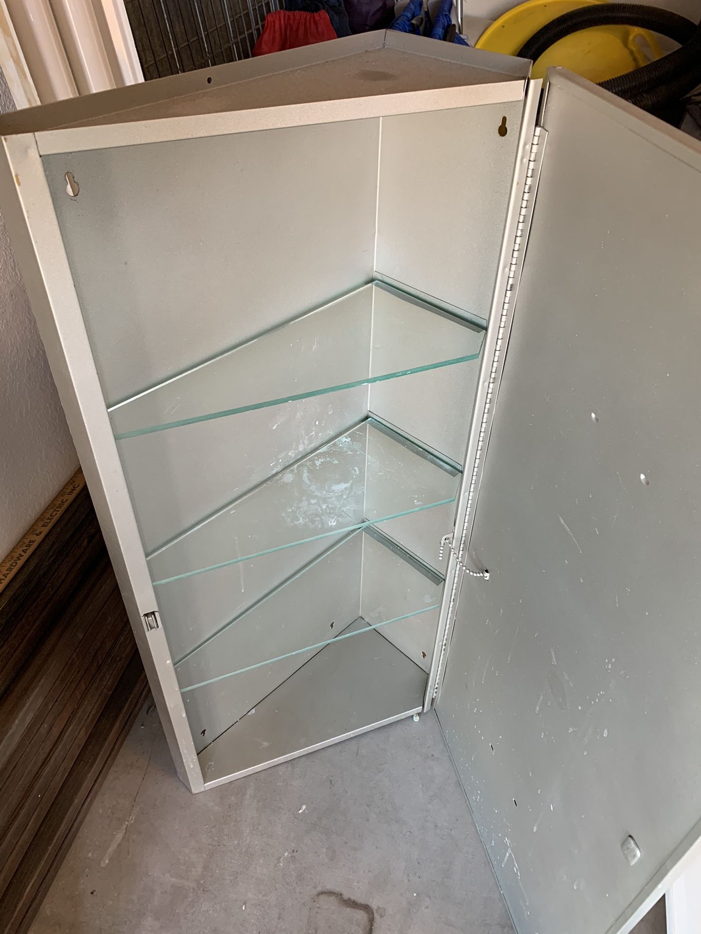 Corner medicine cabinet with mirror