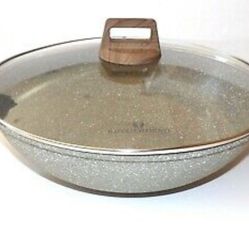 Natural Elements Woodstone 14-inch non-stick wok featuring a gray speckled finish and a matching glass lid with a wood-grain handle.