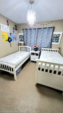 USED WHITE TWIN BED WITH TRUNDLE- AND MATTRESS. $150 .....AND  WHITE TWIN BED WITH MATRESS $100