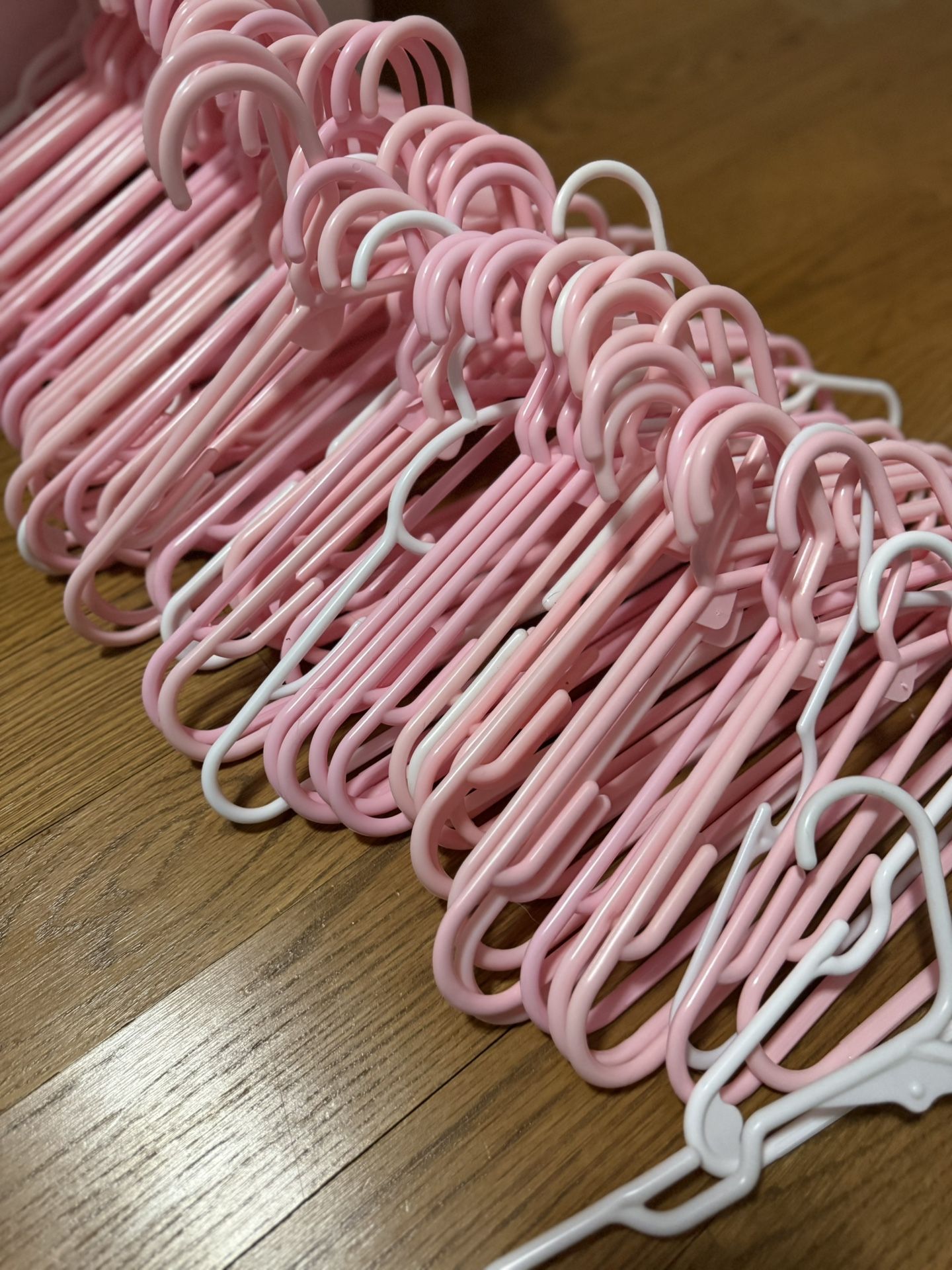 Plastic Pink & White Hangers 80