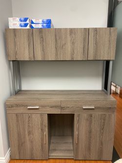 Grey wood cabinet.