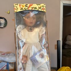 Black porcelain Doll