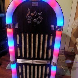 Craig  Jukebox Speaker System, Changing Light Colors Bluetooth Enabled, FM Radio Remote And Power Adapter Included. 