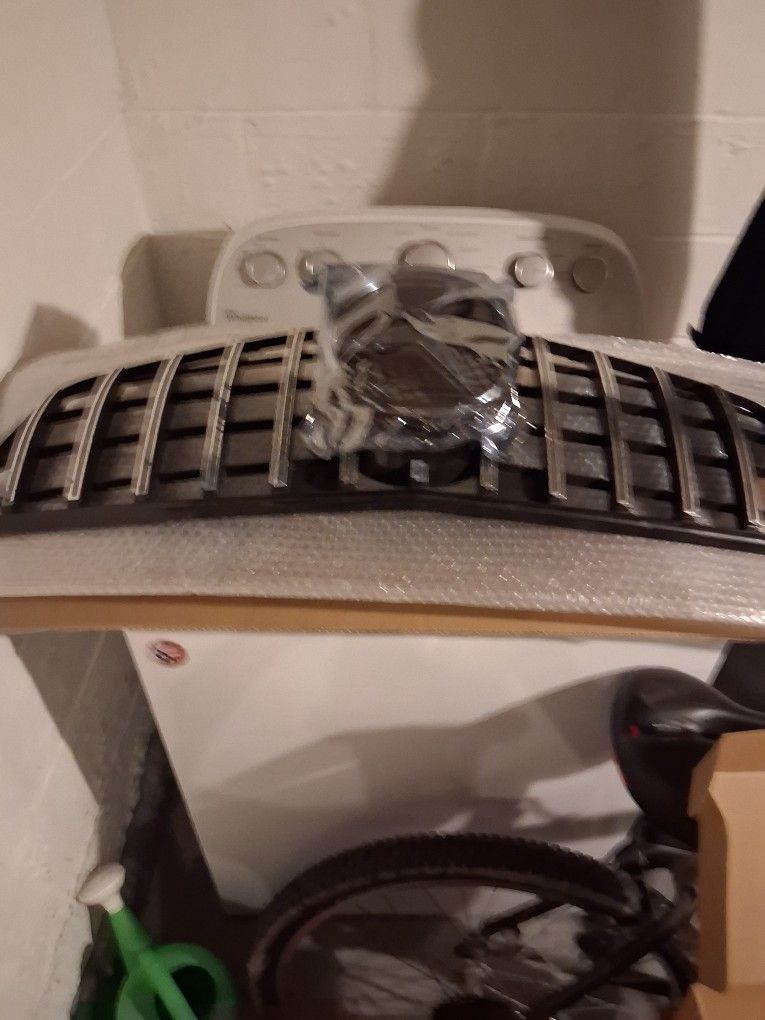 All Brand Nee Mercedes Changing Color Mercedes Emblem that goes in a center of your grill along with a brand new custom grill and brand new Tail Light