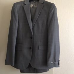Mans Suit ( 36 Regular) New With Tags Sells For $328.00 Selling For $200.00