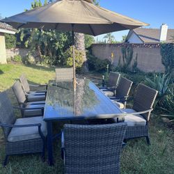 Aluminum Table And Chairs With An Umbrella 