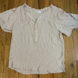 Maurices cream blouse with ruffle details and button up front. Size L