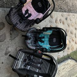 Three baby carriers with their bases