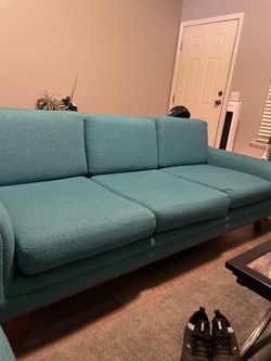 Turquoise couch and chair