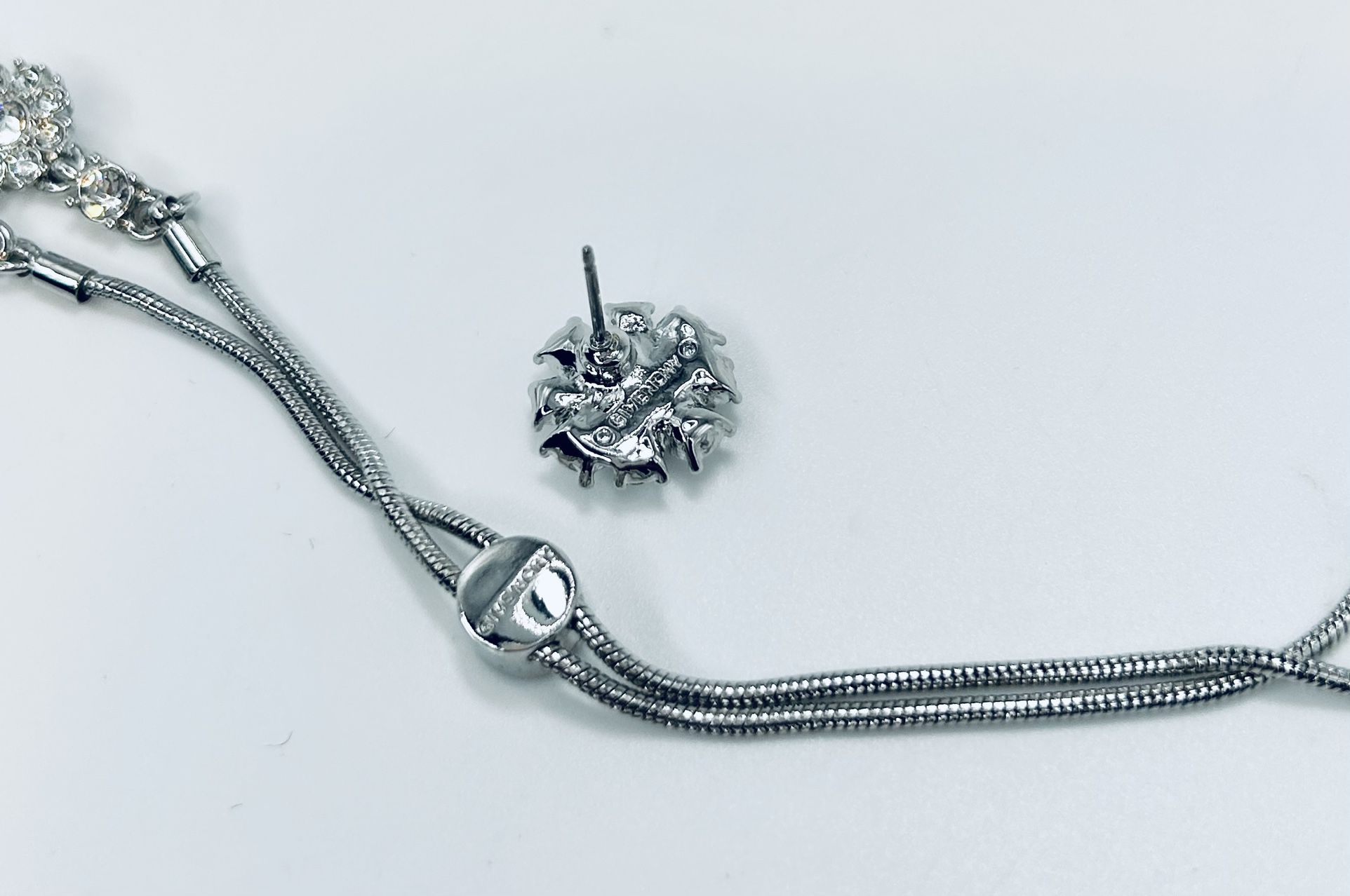 Givenchy Flower set Silver tone, adjustable bracelet, earrings.5” for Sale  in Philadelphia, PA - OfferUp