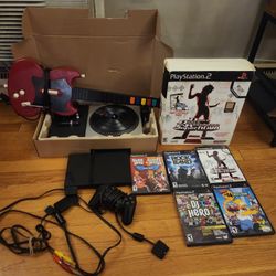 PS2 SLIM WITH GAMES/DANCEPAD/GUITAR HERO/DJ HERO/EYETOY COMPLETE