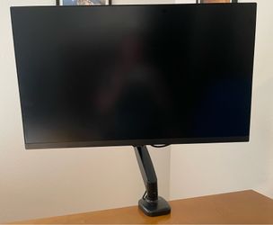 Samsung 27” computer monitor with desk mount articulating arm.