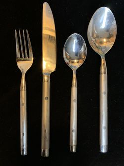 Heavy stainless, 4 piece place setting with tablespoons