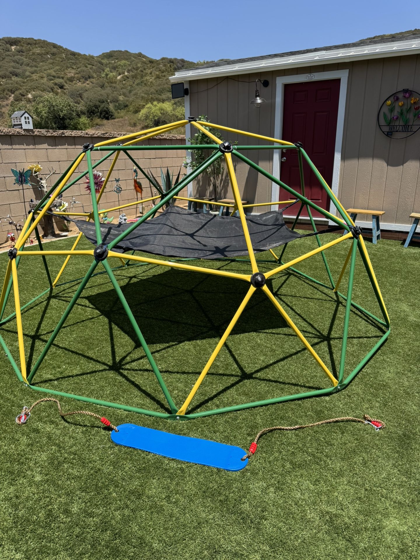 LIKE NEW ..OUR KIDS NEVER USED ! ONLY HAD IT FOR A MONTH ! COMES WITH SWING AND HAMMOCK. YOU MUST DISASSEMBLE.