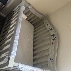 Grey Crib with mattress