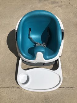 Ingenuity baby booster seat with slide out food tray.