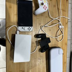 Nintendo Switch Oled 8 Games And Pikachu Wired Controller