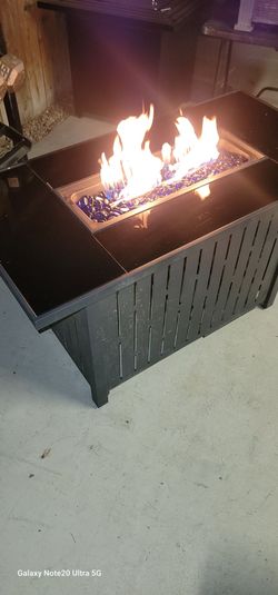 Smoked Glass propane fire pit new condition . Propane Tank Included firm price