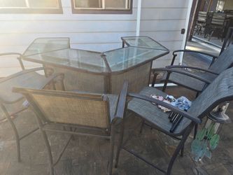 Patio bar with chairs