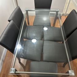 Dinner table with six chairs