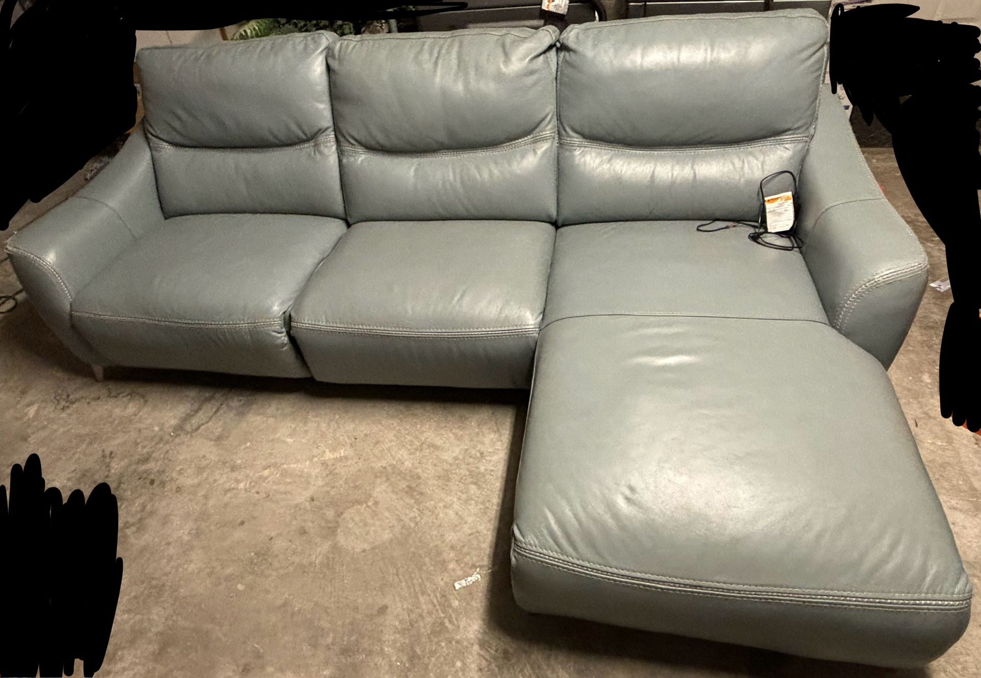 Baby blue leather powered recliner with manual arm chair