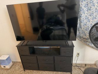 55 in TCL TV with stand