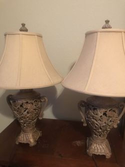Beautiful heavy goldtone lamps.