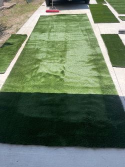 Astro turf fake grass pieces roughly 300 sq ft