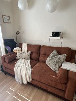 Suede bolster sofa