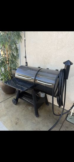 $150 OBO – Traeger pellet grill, powers on but not heating, may need igniter/controller, sold as-is