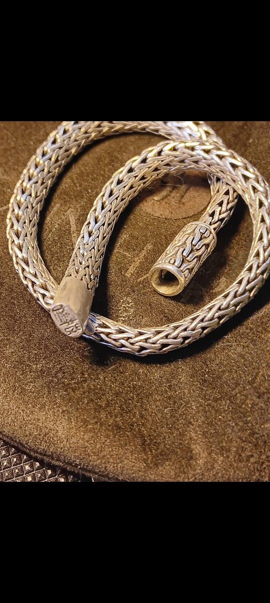 Authentic BRAIDED STERLING JOHN HARDY IN BAG. ORIG 700$