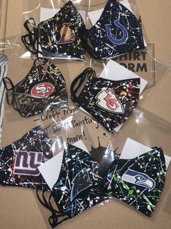 Paint splattered team logo masks