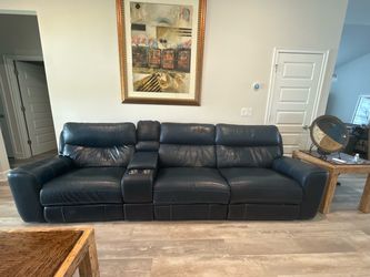 Reclining leather sofa