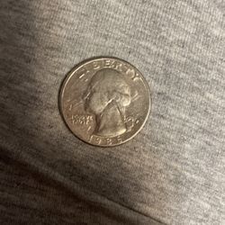 1986 Quarter With A Filled Mint Mark Or Letter