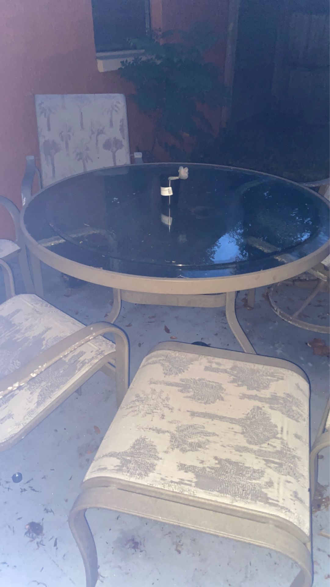 Patio set 7 chairs and 2 ottoman type seats with glass table