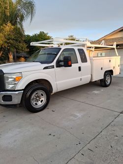 Selling my2015 ford utility bed truck F350 truck.