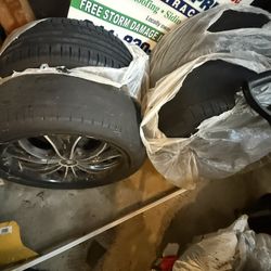 Set of 4 Aftermarket Rims – 2 Like-New Tires – One Bent Lip – $200 OBO